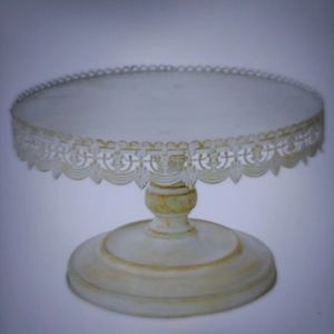 Unusual beautiful cake stand. Brand new never been used. Still in the box